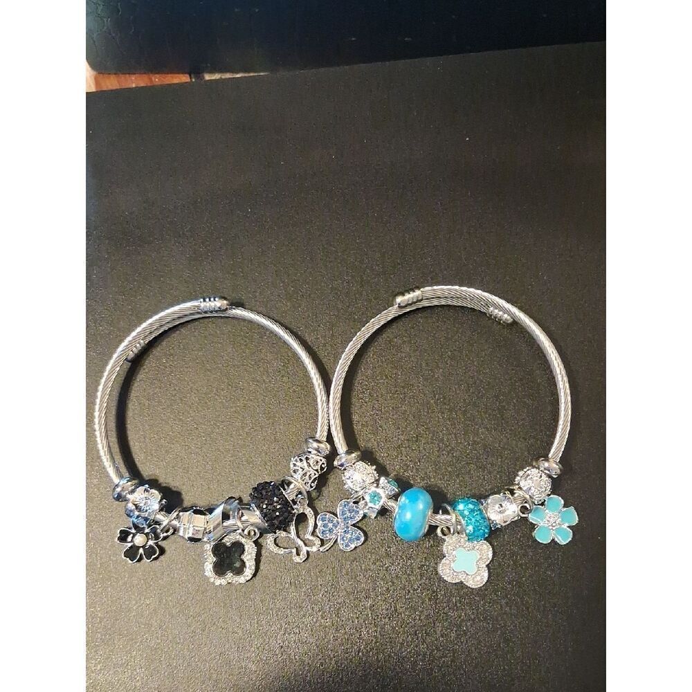Two Silver Black And Blue Charm Adjustable Bracelets New In Boxes